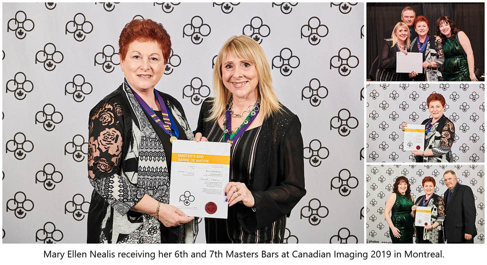 Mary Ellen Nealis receiving 6th & 7th Masters Bars