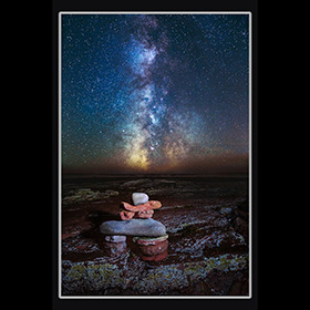 An image of the Milky Way over an Inuk Shuk, by Donald Lewis