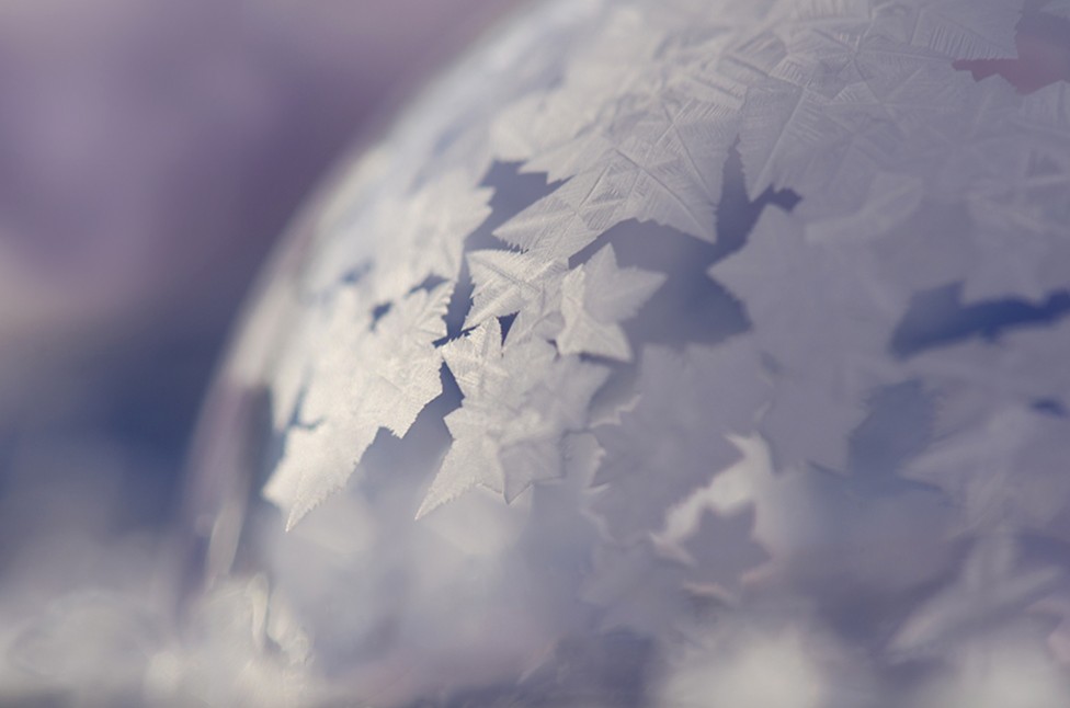 Frost forming on a soap bubble