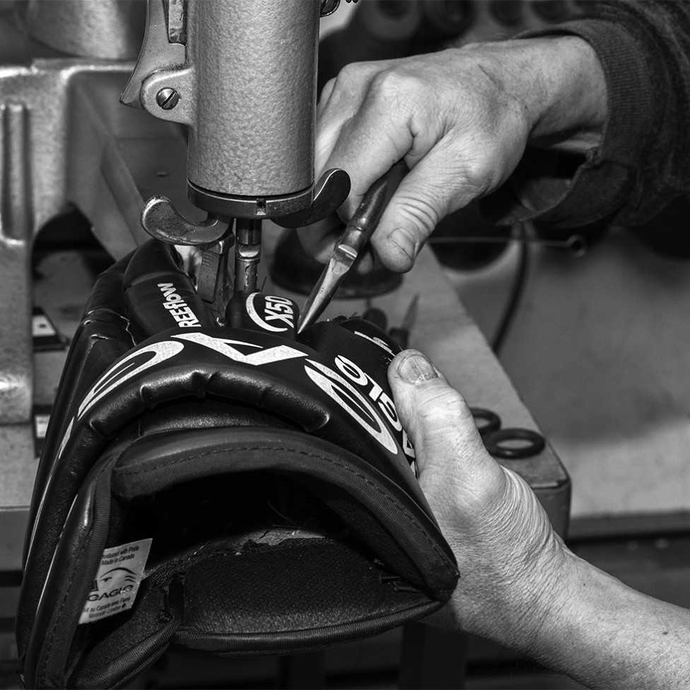 A black and white photo of industrial sewing