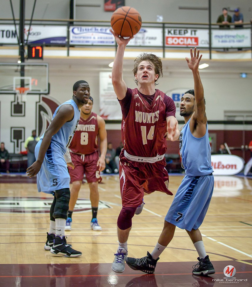 Basketball action shot from The 2017 Canadian Collegiate Athletic Association Men’s Basketball Championship by Mike Bernard