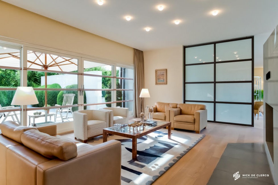 An interior real estate photo showing a beautiful living room in a villa by Nova Scotia photographer Nick De Clercq