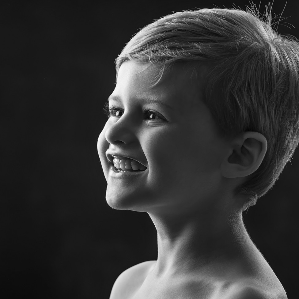 A timeless black and white portrait of a young boy by Louise Vessey