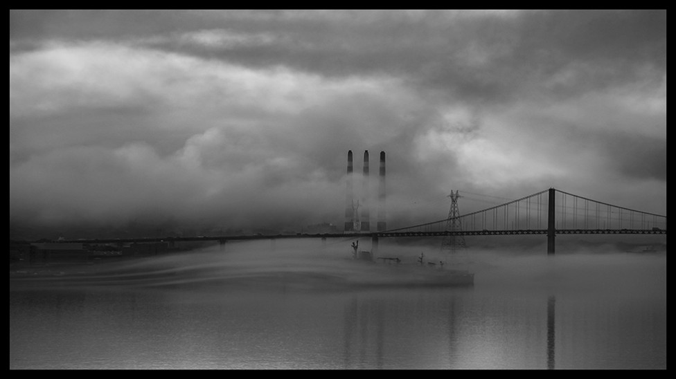 A black and white photo of a foggy morning on the Bedford Basin